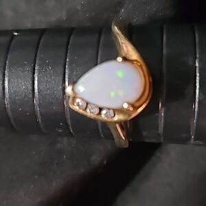 Opal ring with the diamonds set on 10 karat gold band